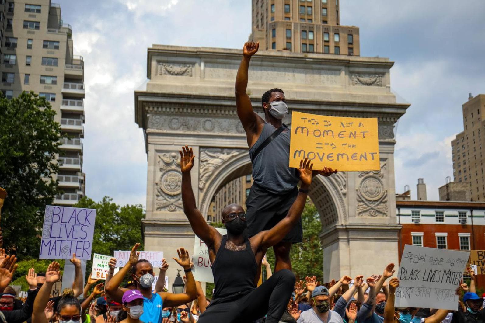 Activists gather at a Black Lives Matter protest at the park.